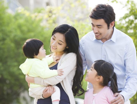 Happy young Chinese family