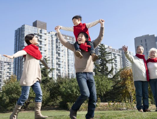 three-generation-family-enjoying-a-park-in-autumn-2024-10-18-06-53-29-utc